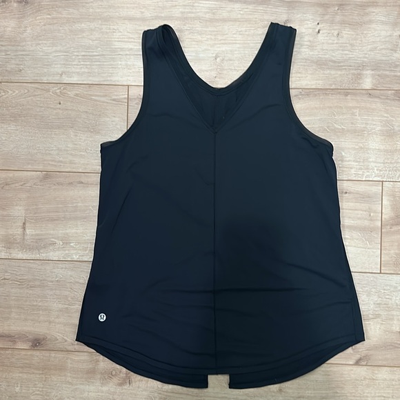 Lululemon black loose fitting v-neck tank top. Reversible with slit - Picture 2 of 6